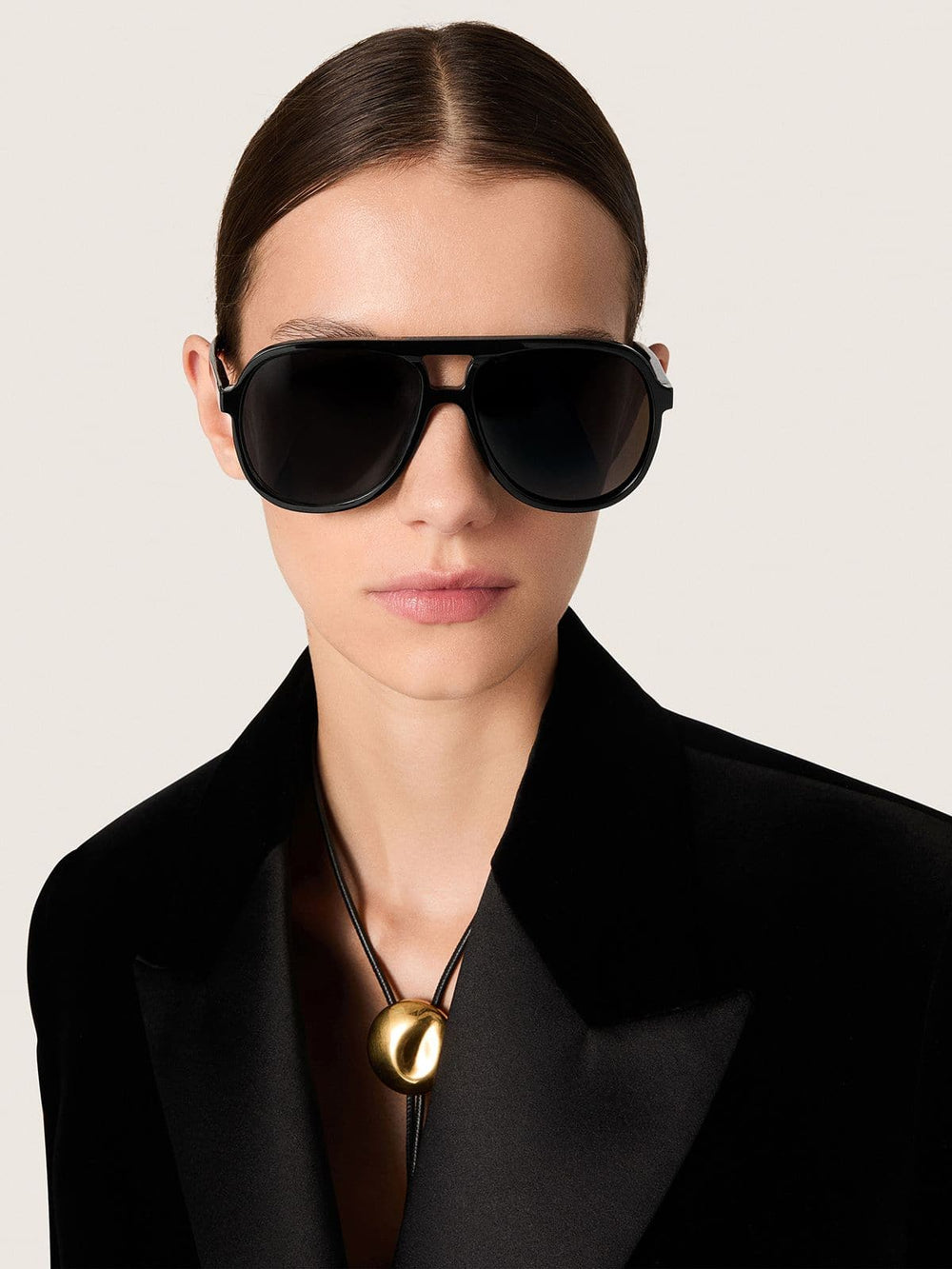 Golden Goose Aviator style sunglasses with black frame and lenses