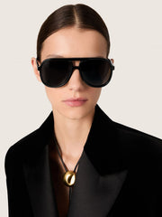 Golden Goose Aviator style sunglasses with black frame and lenses