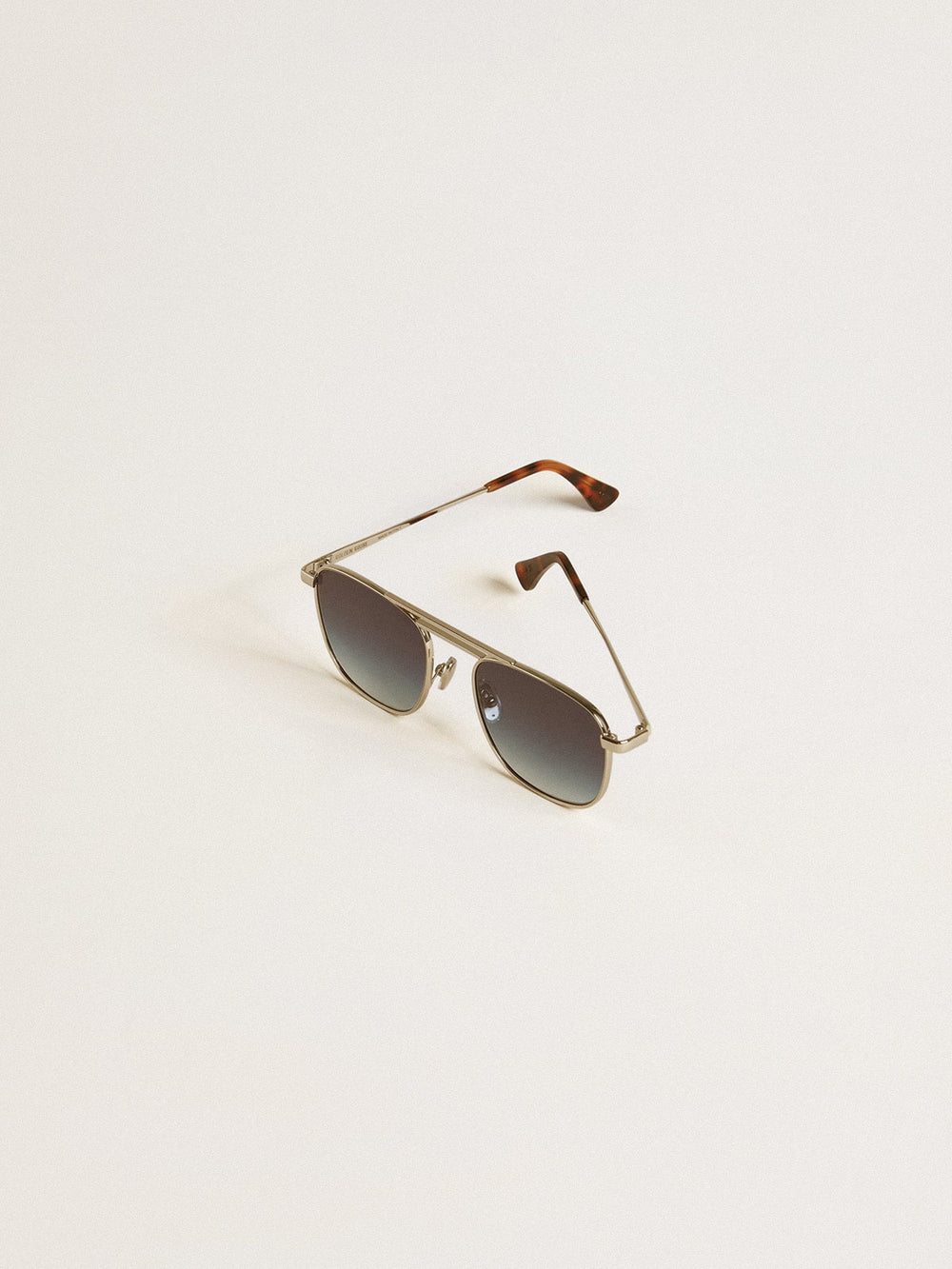 Golden Goose Aviator style sunglasses with silver frame and blue lenses