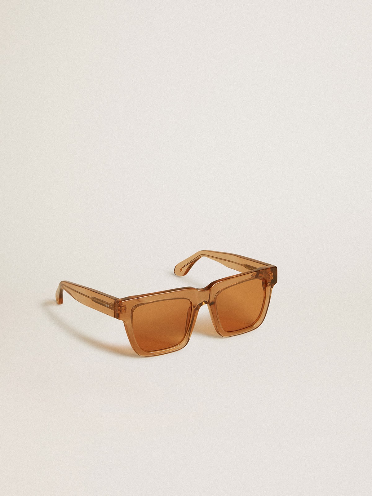 Golden Goose Jamie style square sunglasses with honey-colored frame and lenses