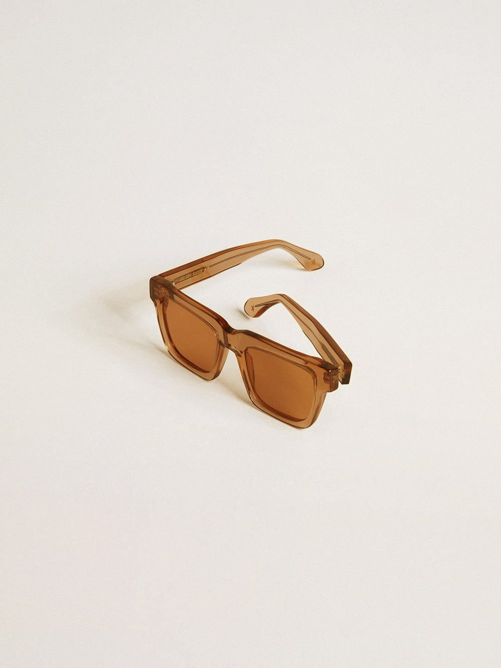 Golden Goose Jamie style square sunglasses with honey-colored frame and lenses