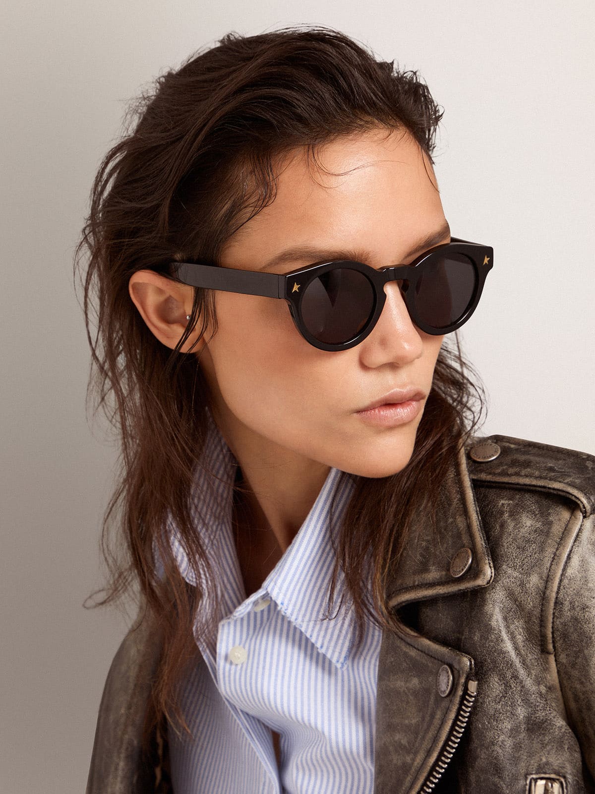 Golden Goose Sunframe Panthos model with black frame and gold details