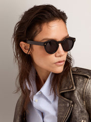 Golden Goose Sunframe Panthos model with black frame and gold details