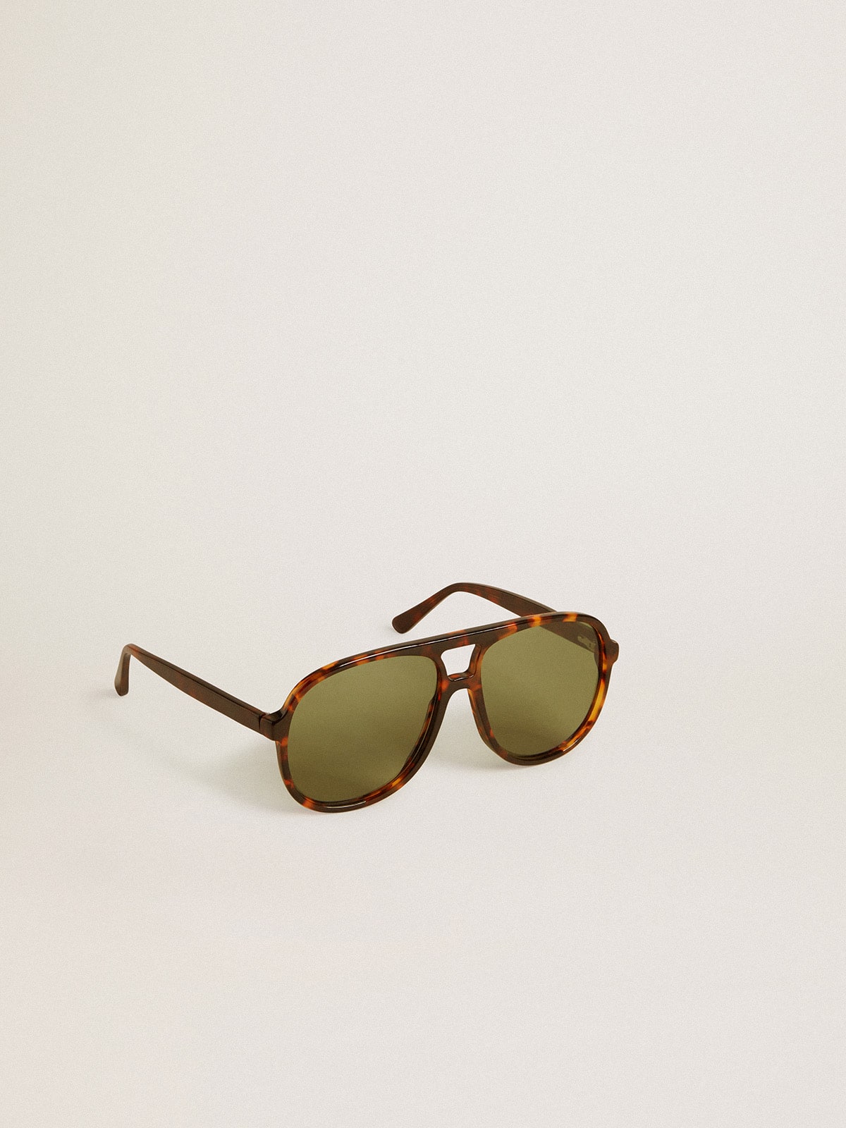 Golden Goose Aviator style sunglasses with tortoiseshell frame and green lenses