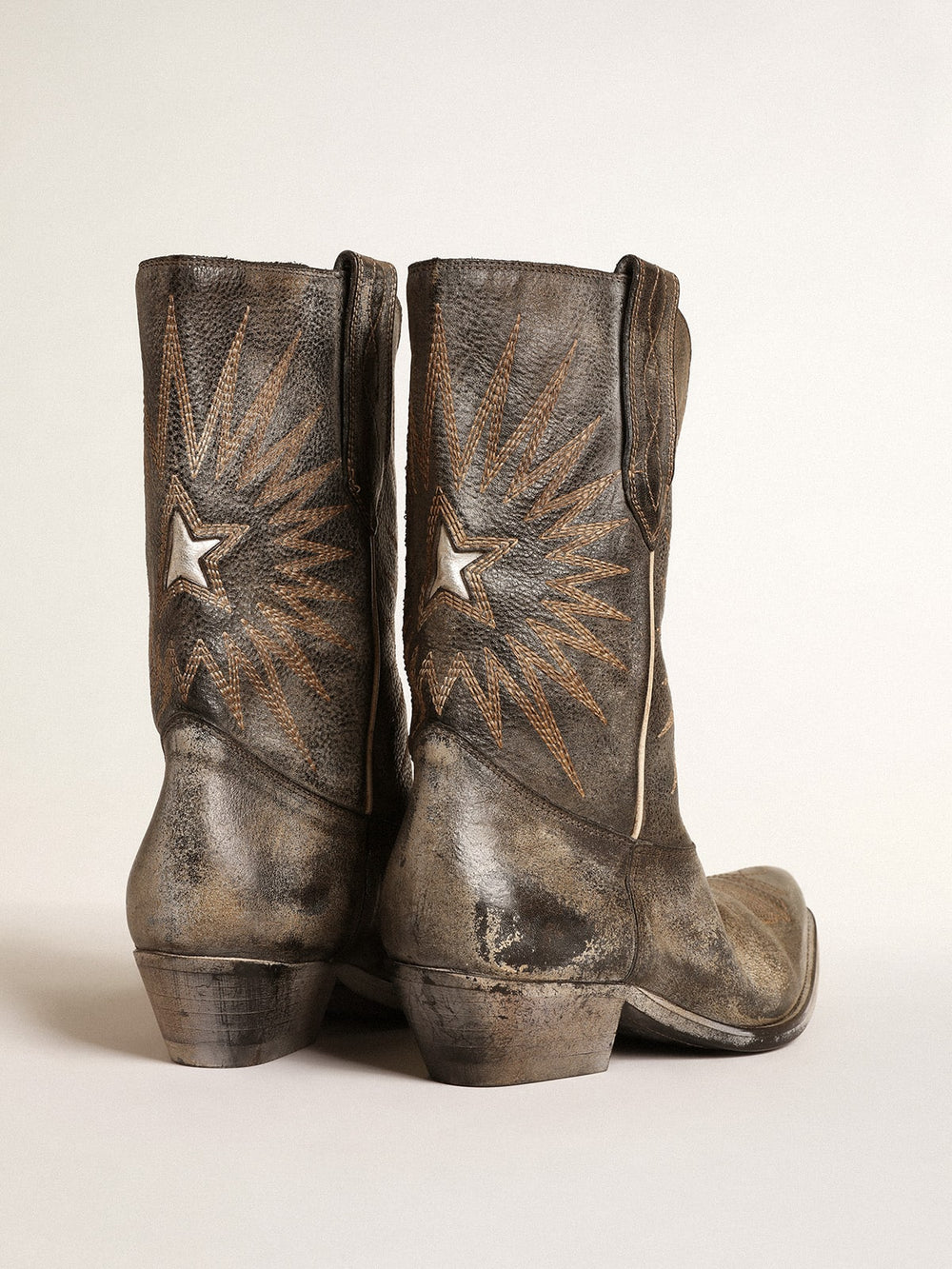 Golden Goose Women’s low Wish Star boots in black leather with silver star