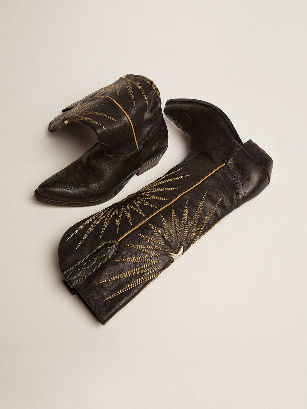 Golden Goose Wish Star boots in black leather with platinum laminated leather inlay star