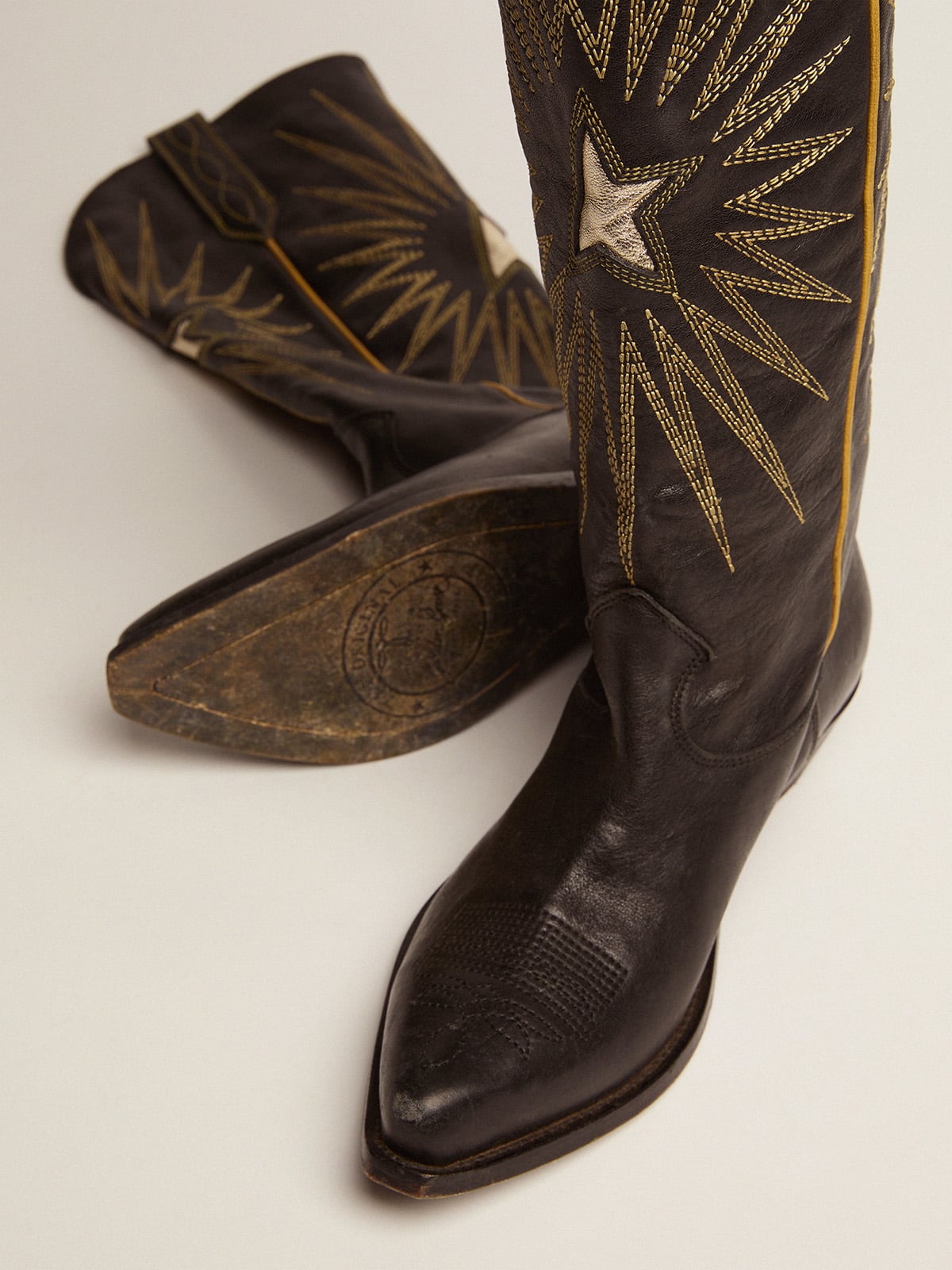 Golden Goose Wish Star boots in black leather with platinum laminated leather inlay star