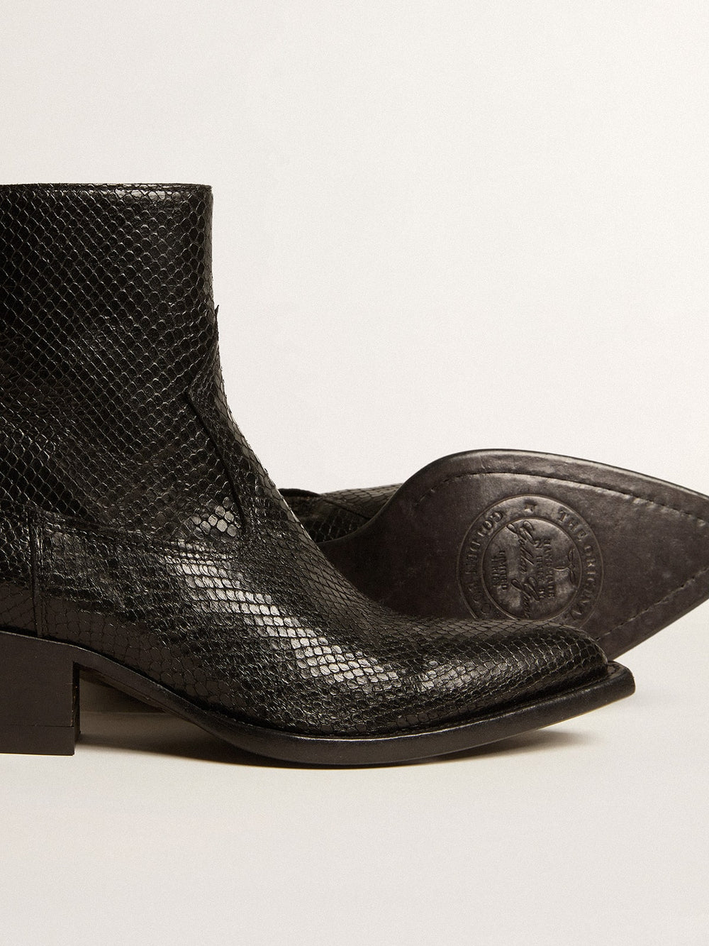 Golden Goose Low Debbie boots in black snake-print leather