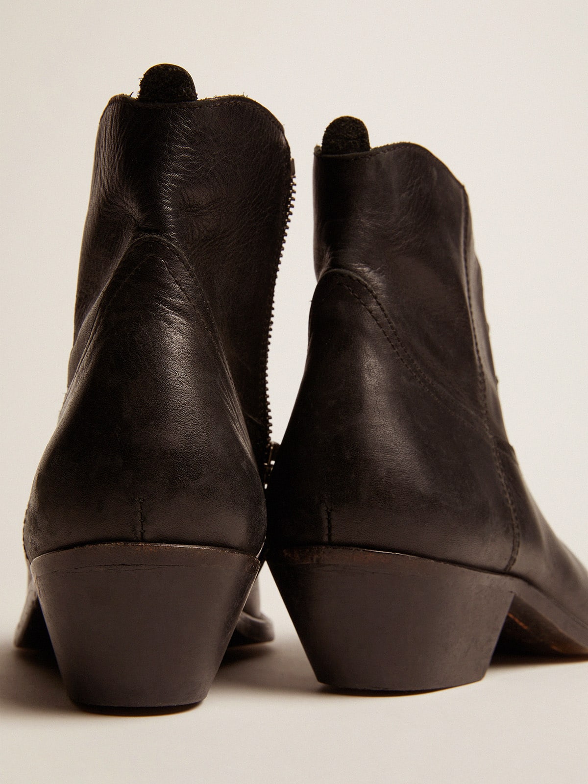 Golden Goose Young ankle boots in black leather with sand-colored embroidery