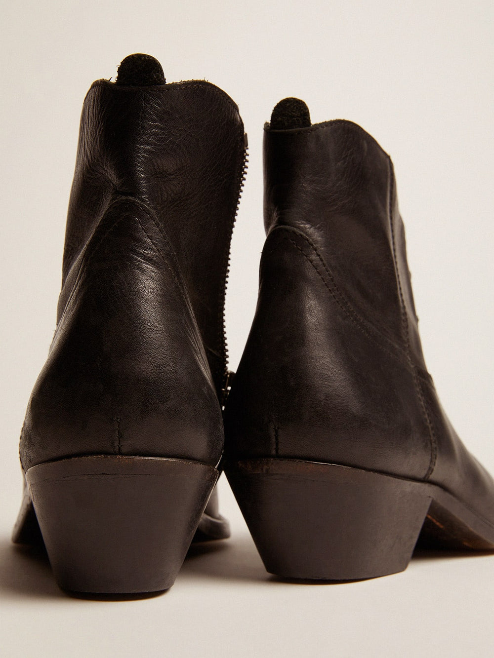 Golden Goose Young ankle boots in black leather with sand-colored embroidery