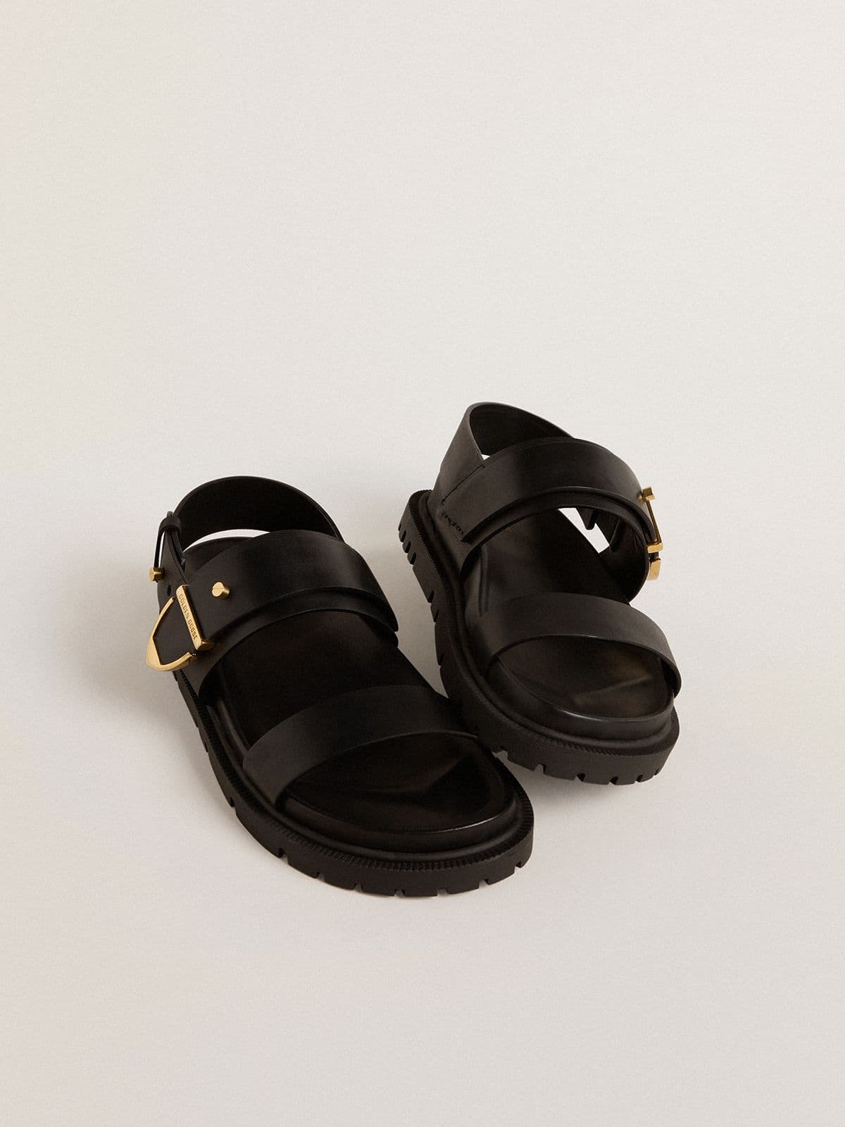 Golden Goose Women's Lucy sandal in glossy black leather with gold metal buckle