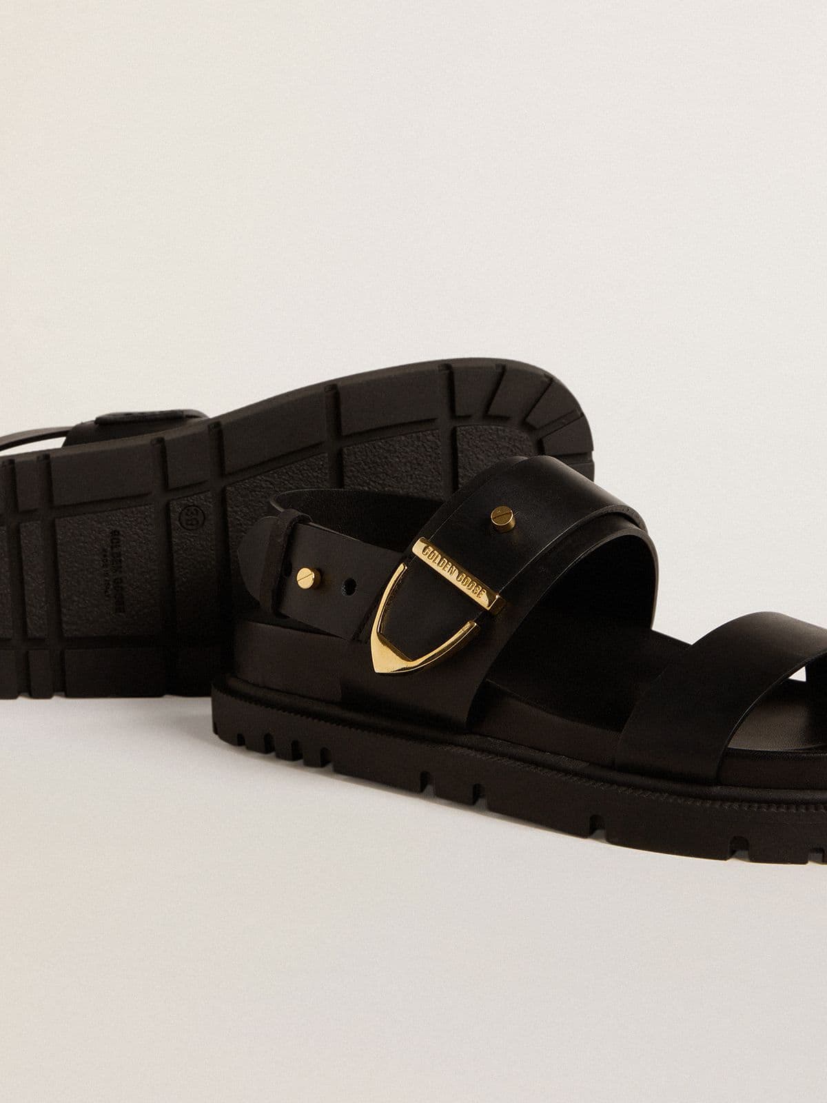 Golden Goose Women's Lucy sandal in glossy black leather with gold metal buckle