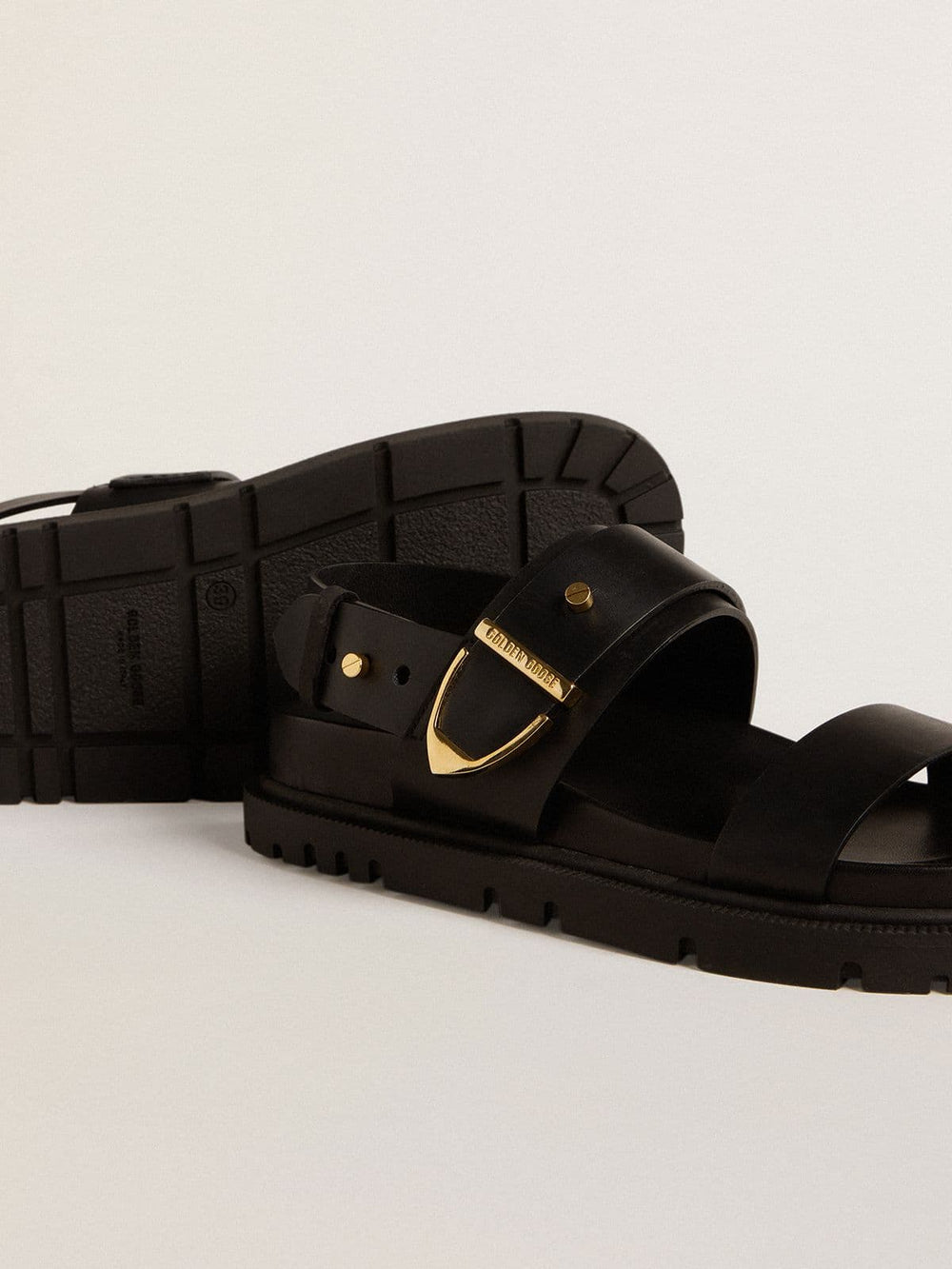Golden Goose Women's Lucy sandal in glossy black leather with gold metal buckle