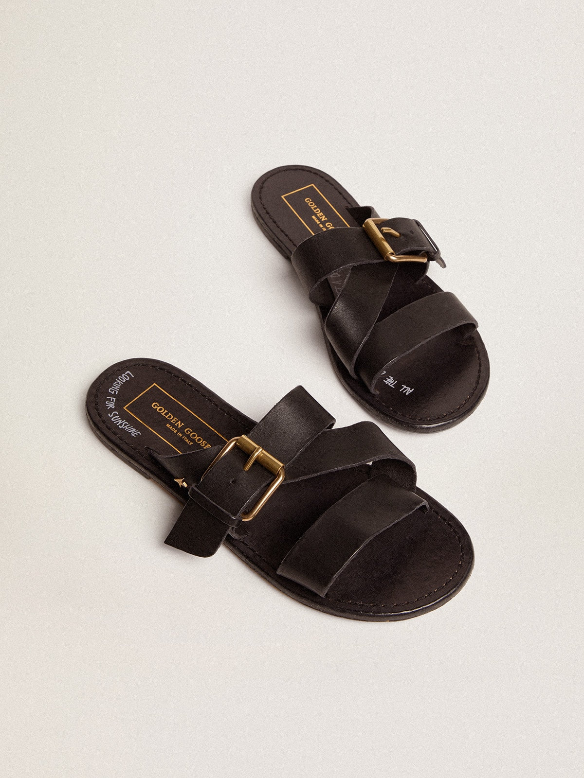 Golden Goose Black leather flat sandals with buckle Margaret | Golden Goose