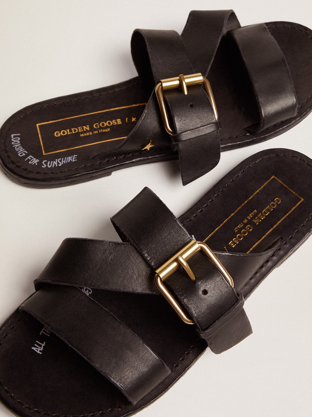 Golden Goose Black leather flat sandals with buckle Margaret | Golden Goose