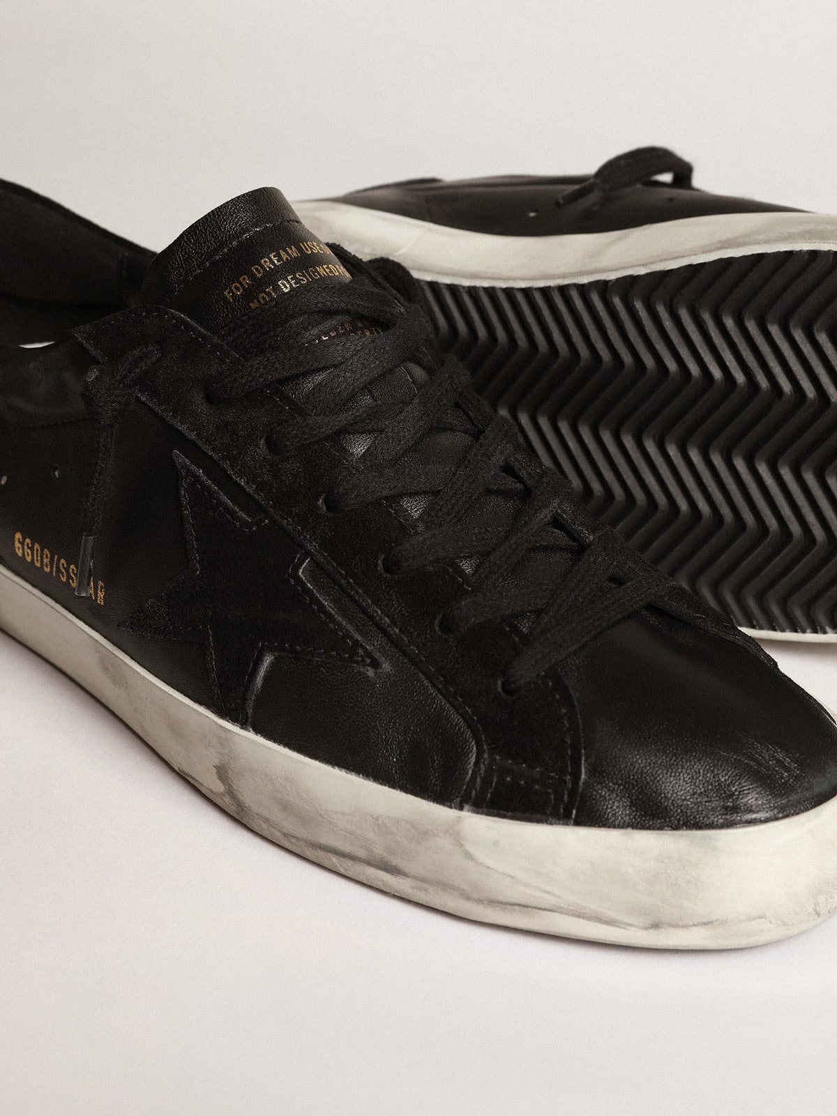 Golden Goose Men's Super-Star in black nappa with black suede star and heel tab