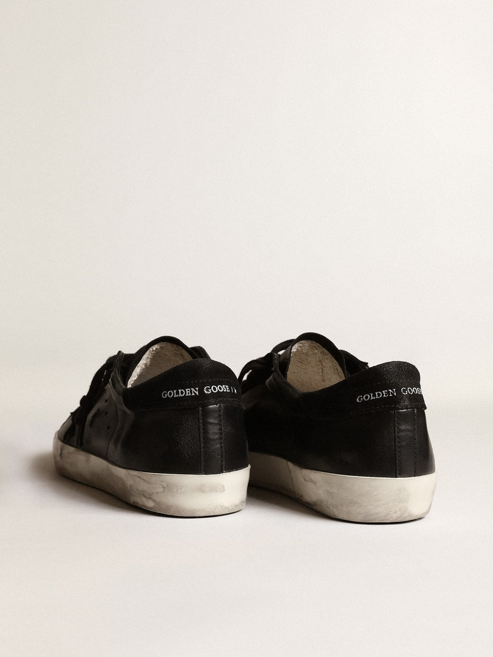Golden Goose Men's Super-Star in black nappa with black suede star and heel tab