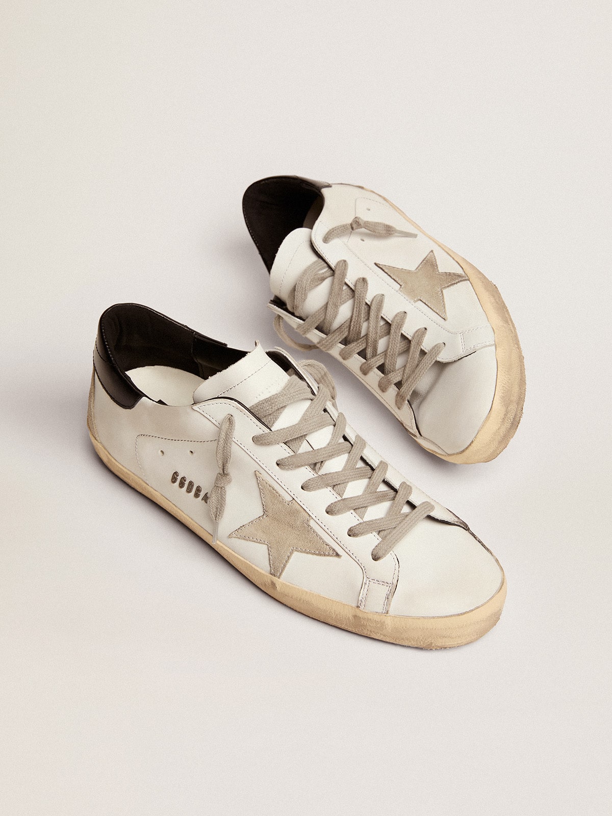 Golden Goose Men's Super-Star with black heel tab and metal stud lettering