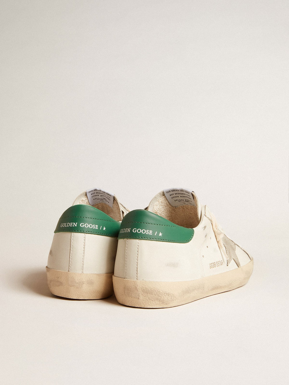 Golden Goose Super-Star in white leather with ice-gray suede star and green leather heel tab