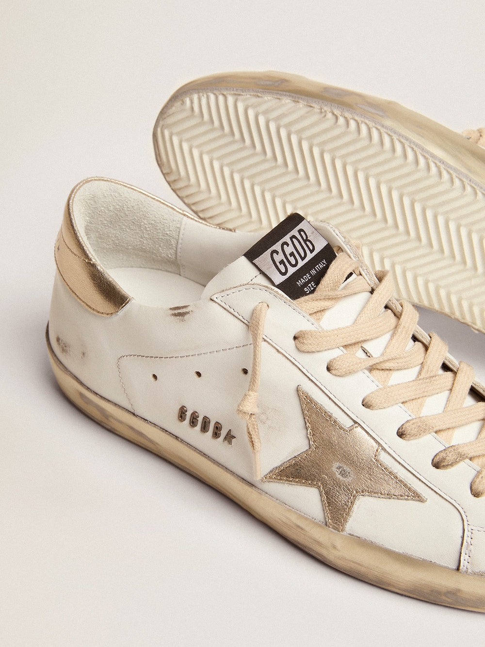 Golden Goose Men's Super-Star with gold sparkle foxing and lettering