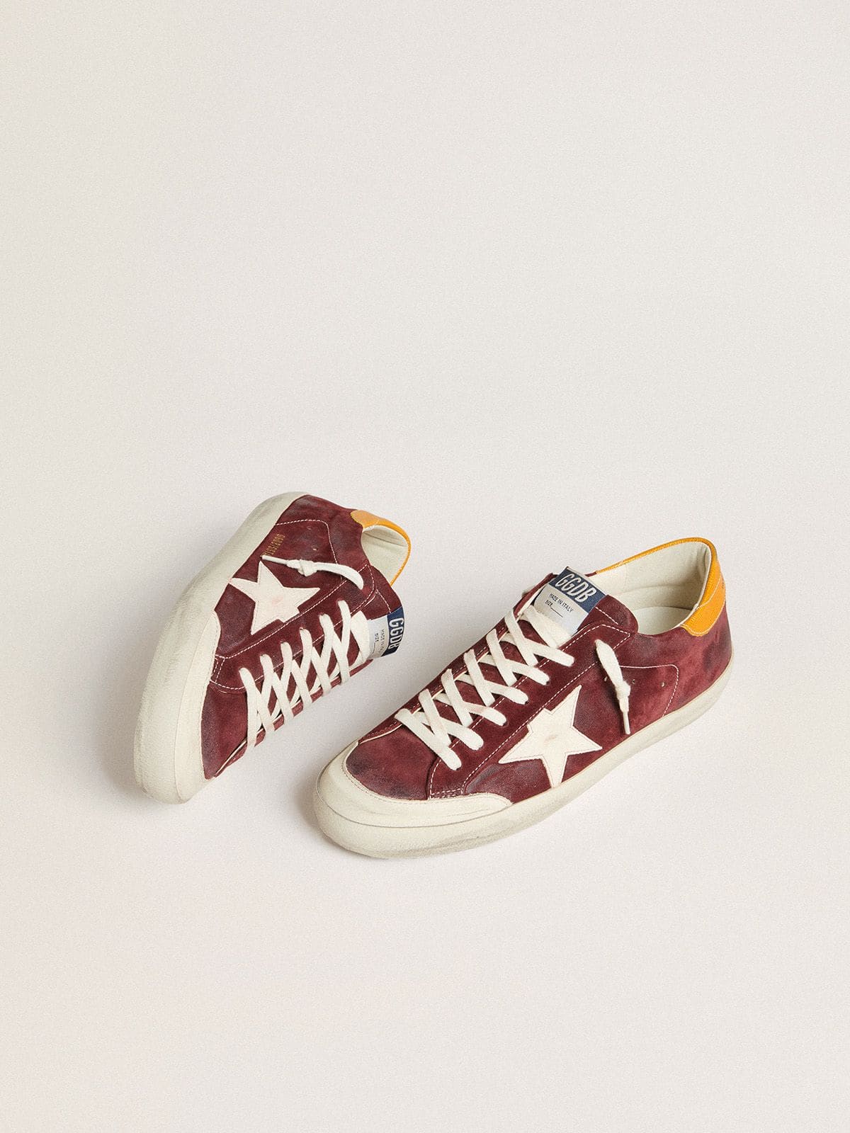 Golden Goose Men’s Super-Star in brick-red suede with white leather star and animal-print heel tab
