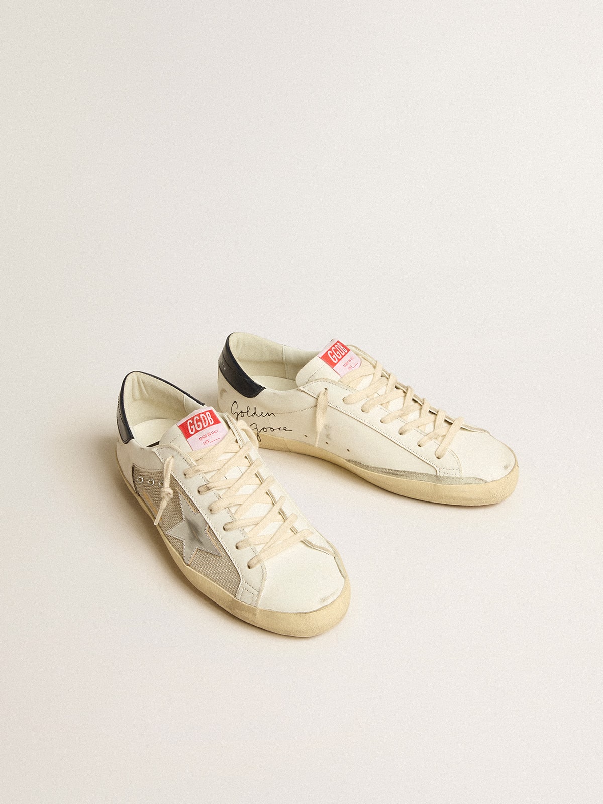 Golden Goose Men's Super-Star LTD in mesh and leather with silver star and blue heel tab