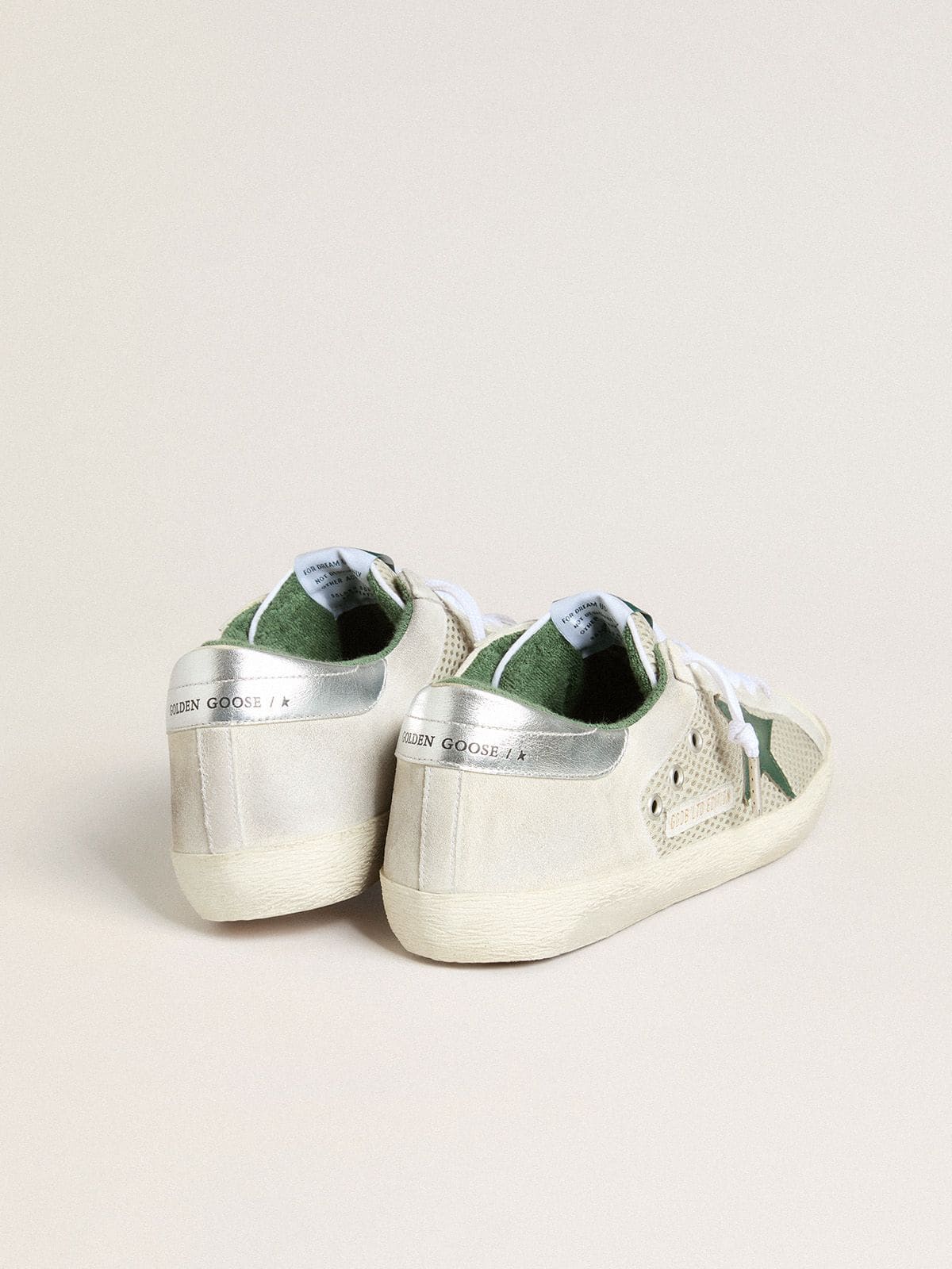 Golden Goose Men’s Super-Star LTD in white suede and mesh with green leather star and silver heel tab