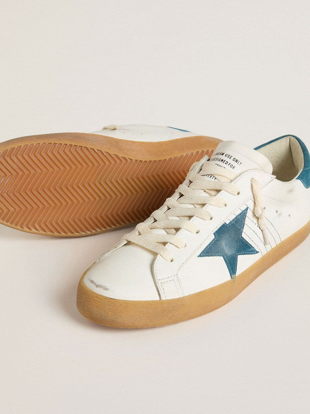 Golden Goose Men's Super-Star in leather with petrol-blue suede star and heel tab