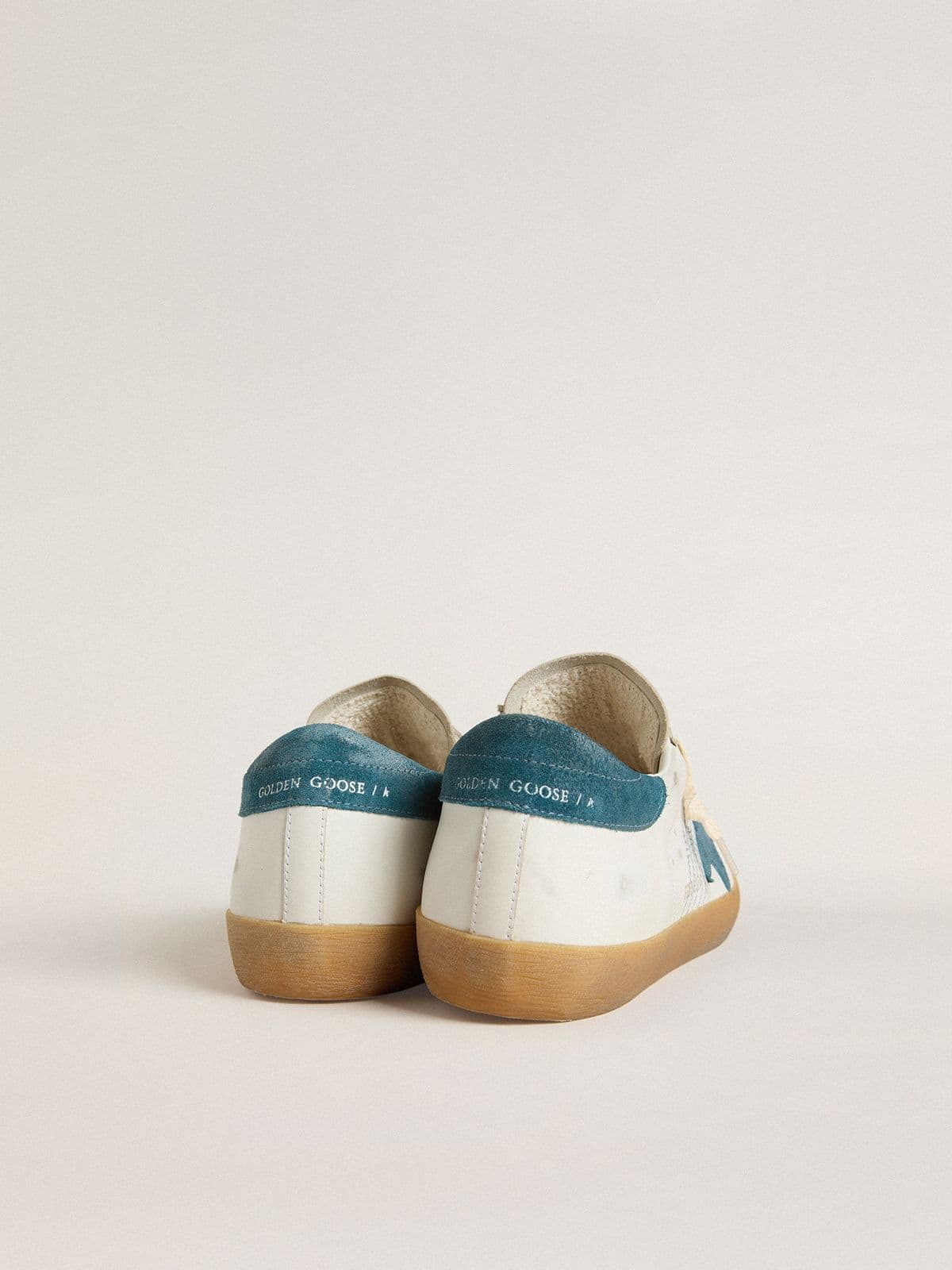 Golden Goose Men's Super-Star in leather with petrol-blue suede star and heel tab