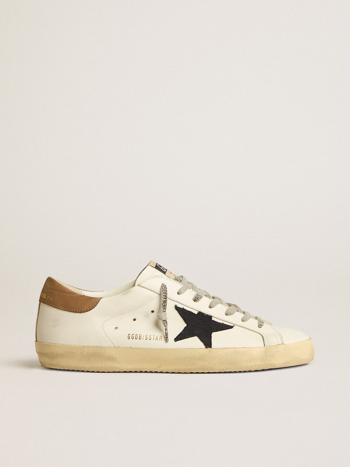 Golden Goose Men's Super-Star in white leather with midnight-blue canvas star and tobacco leather heel tab