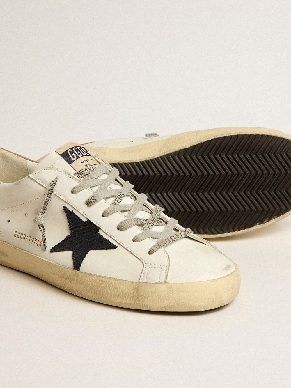 Golden Goose Men's Super-Star in white leather with midnight-blue canvas star and tobacco leather heel tab