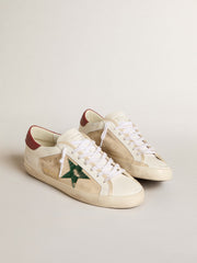 Golden Goose Men's Super-Star LTD in suede with green metallic star and red heel tab