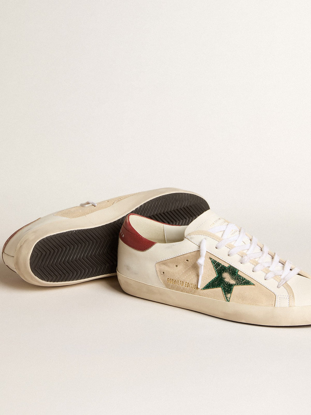 Golden Goose Men's Super-Star LTD in suede with green metallic star and red heel tab