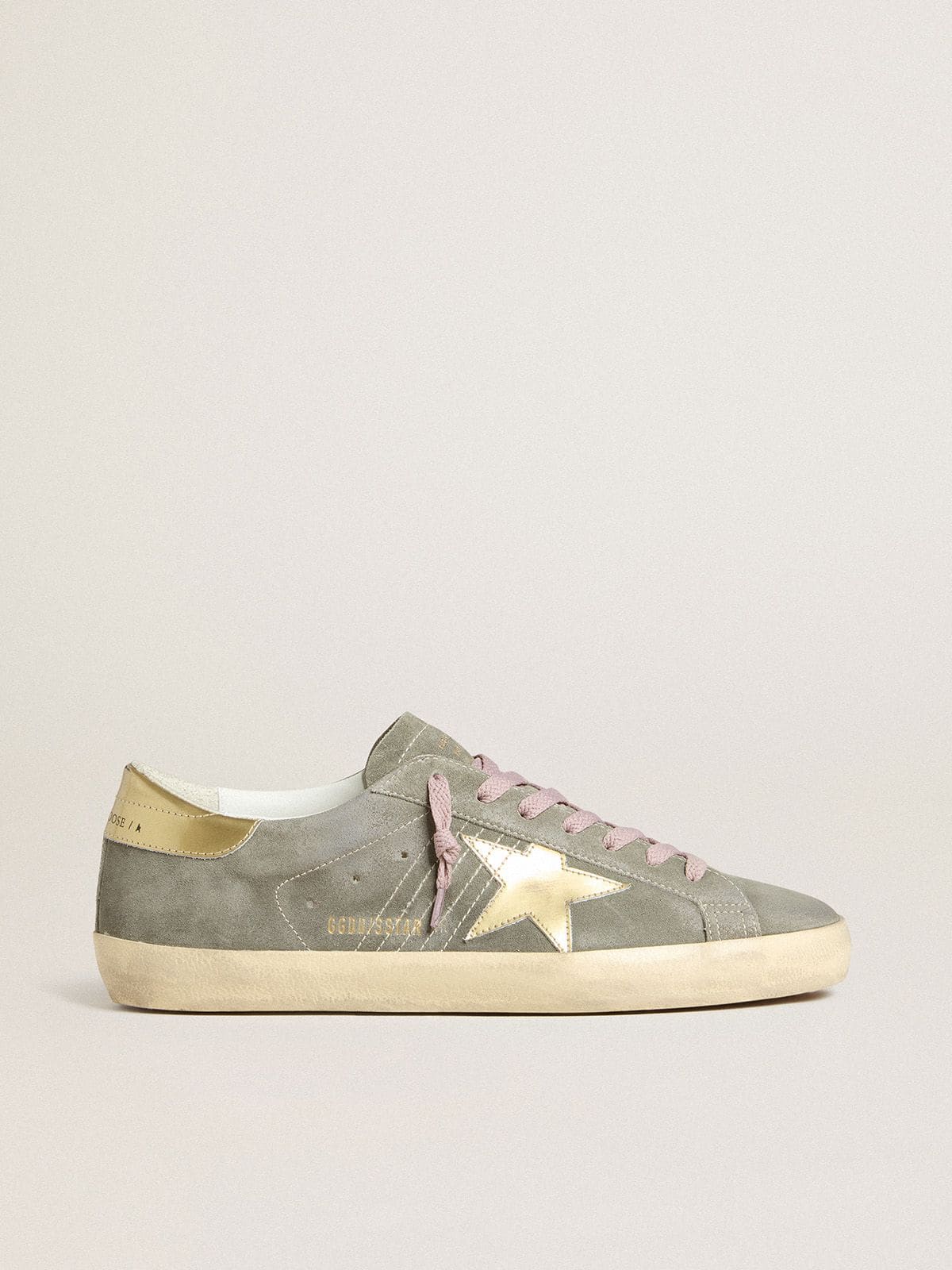 Golden Goose Men's Super-Star in gray suede with gold metallic leather star and heel tab