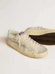 Golden Goose Men's Super-Star  in white leather with all-over lettering and ice-gray suede star
