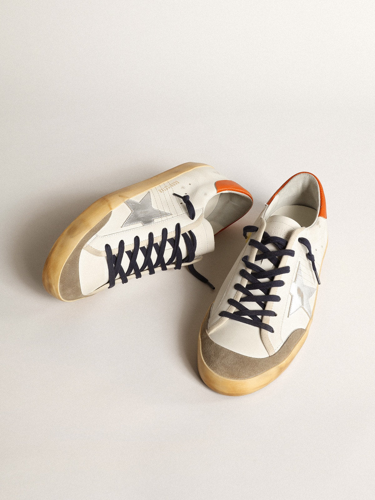 Golden Goose Super-Star Penstar with silver star and orange heel tab