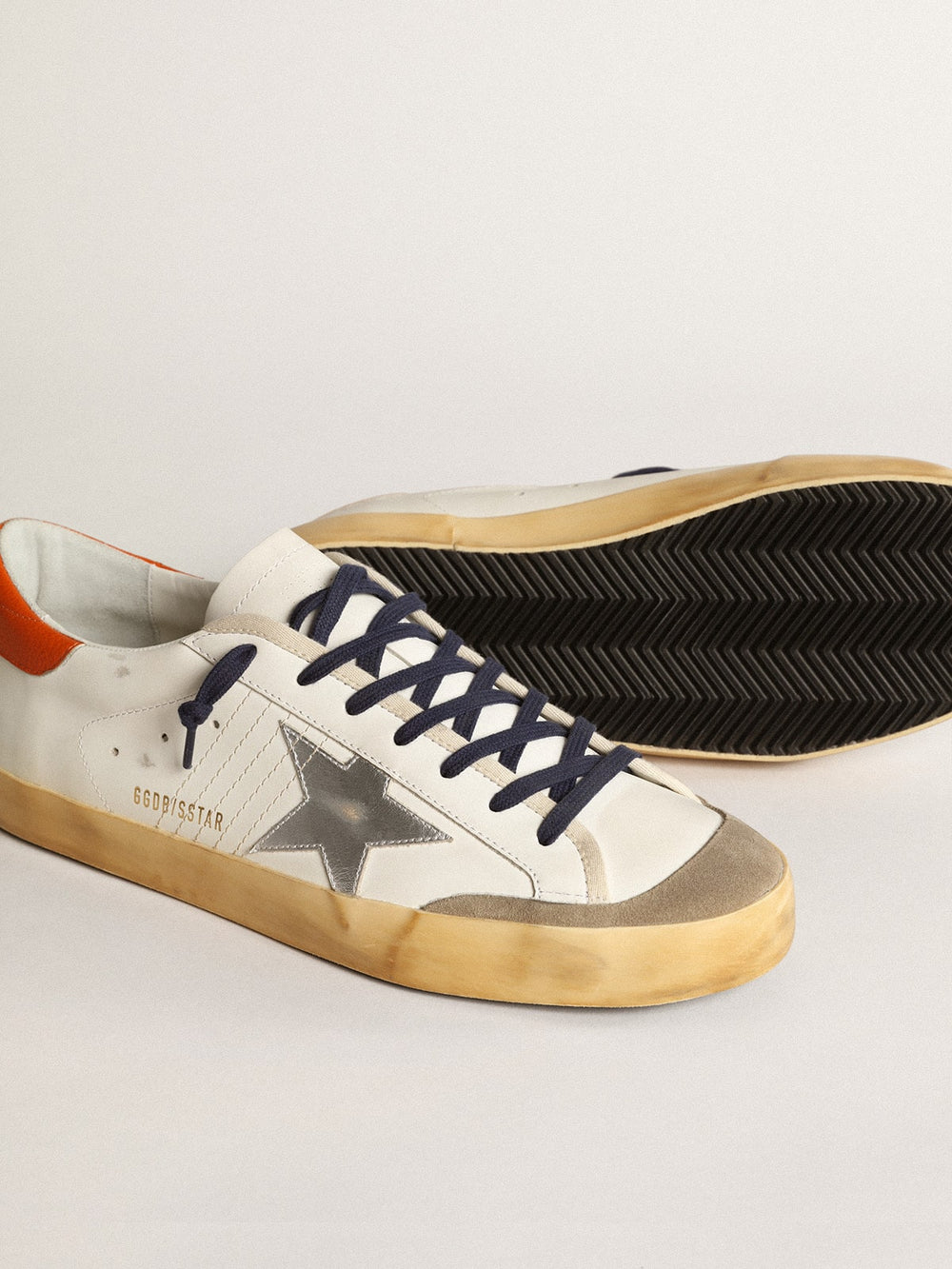 Golden Goose Super-Star Penstar with silver star and orange heel tab