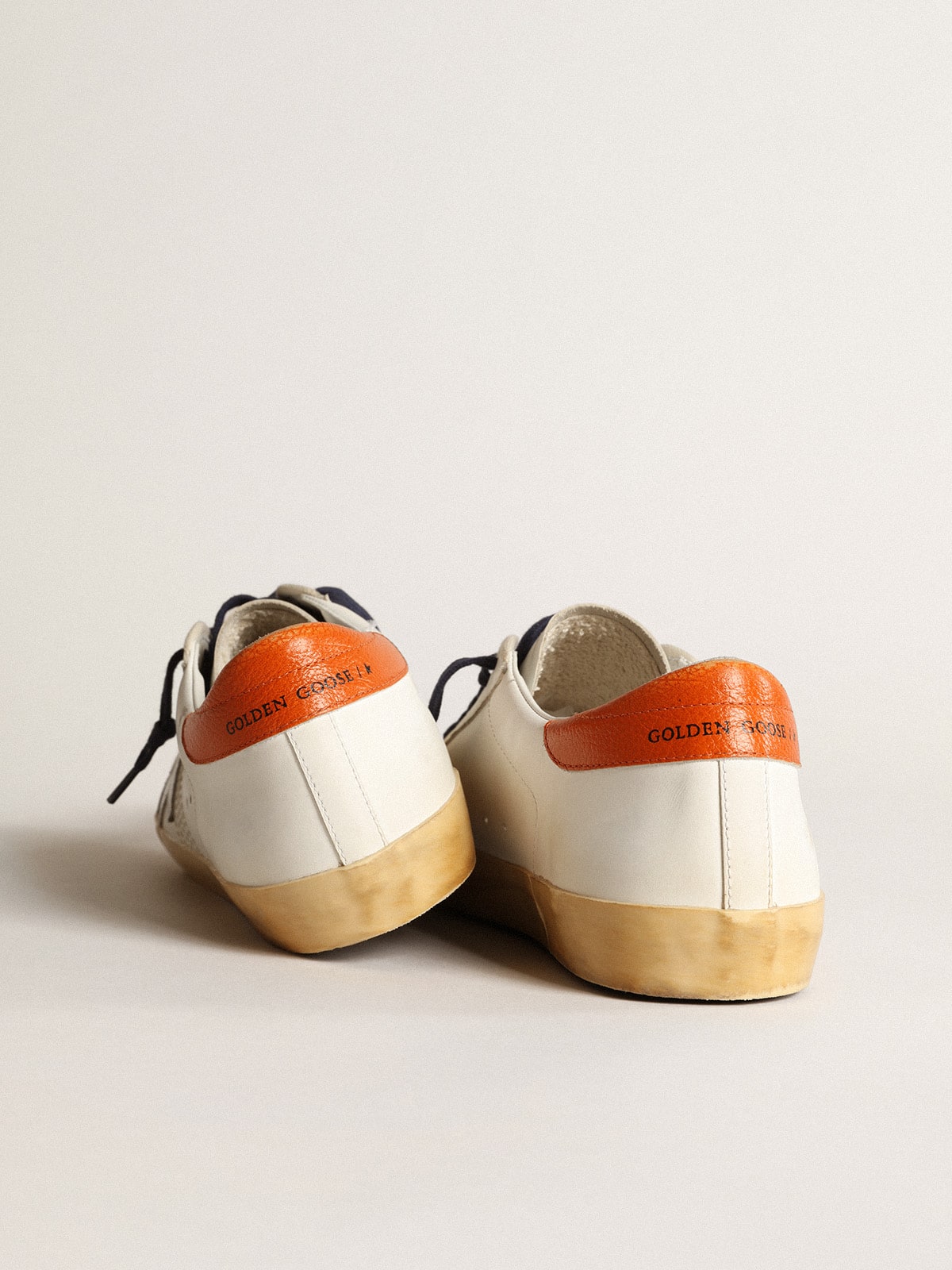 Golden Goose Super-Star Penstar with silver star and orange heel tab
