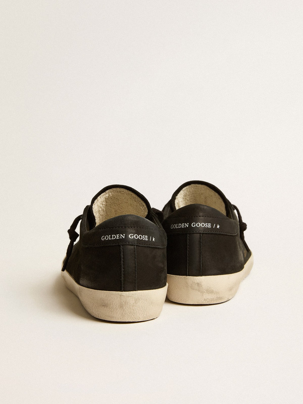 Golden Goose Men's Super-Star in black nubuck with perforated star and black nubuck heel tab