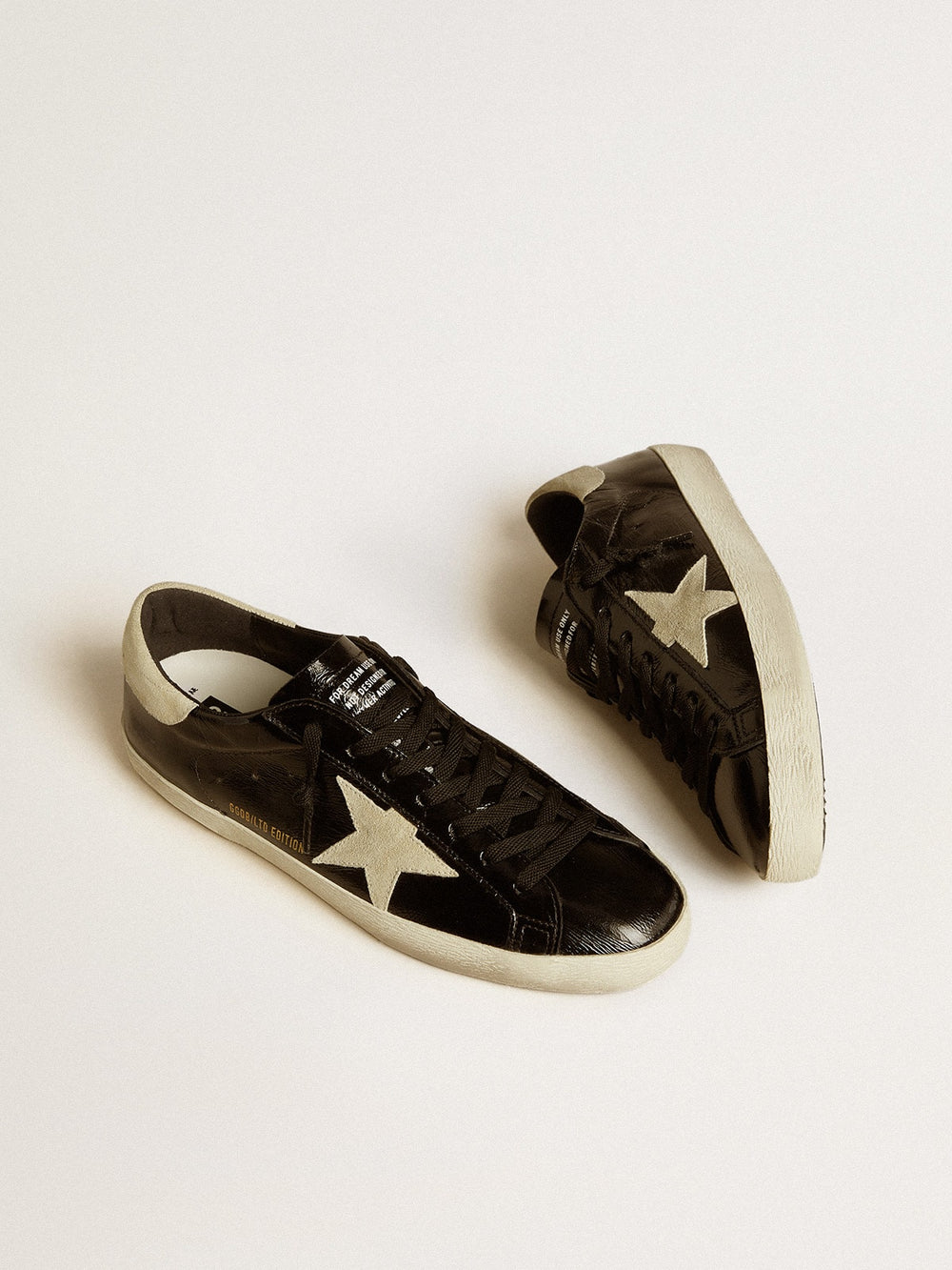 Golden Goose Men's Super-Star  in black patent leather with suede star and heel tab