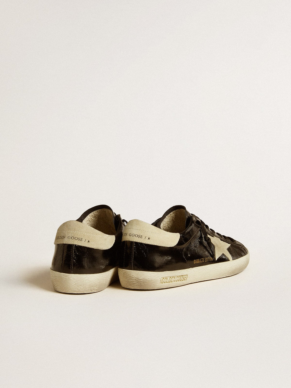 Golden Goose Men's Super-Star  in black patent leather with suede star and heel tab