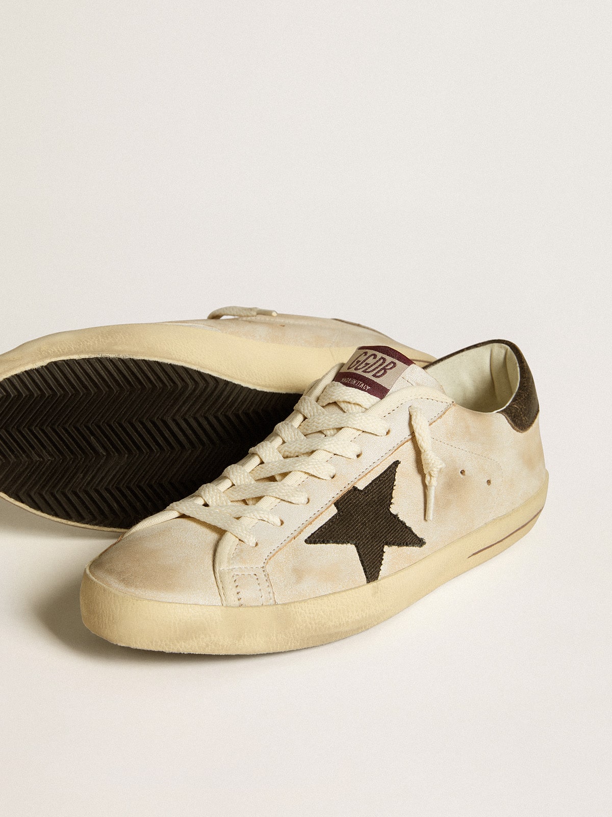 Golden Goose Men's Super-Star in leather with black denim star and black leather heel tab