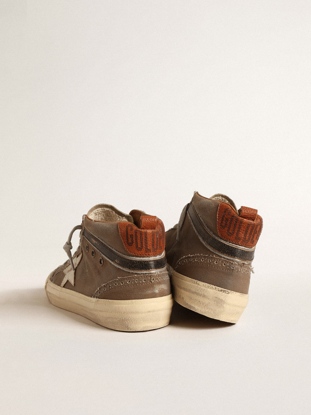 Golden Goose Mid Star in green canvas with leather star and black flash