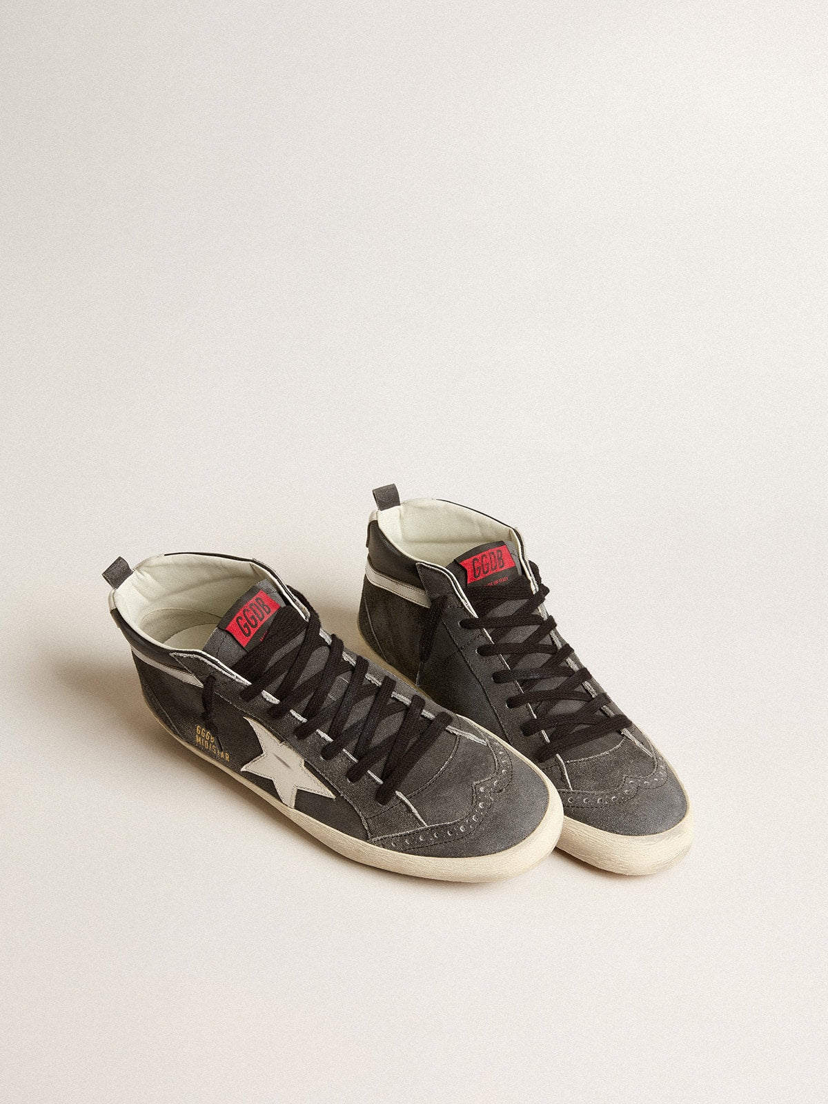 Golden Goose Mid Star in black suede with white leather star and silver flash