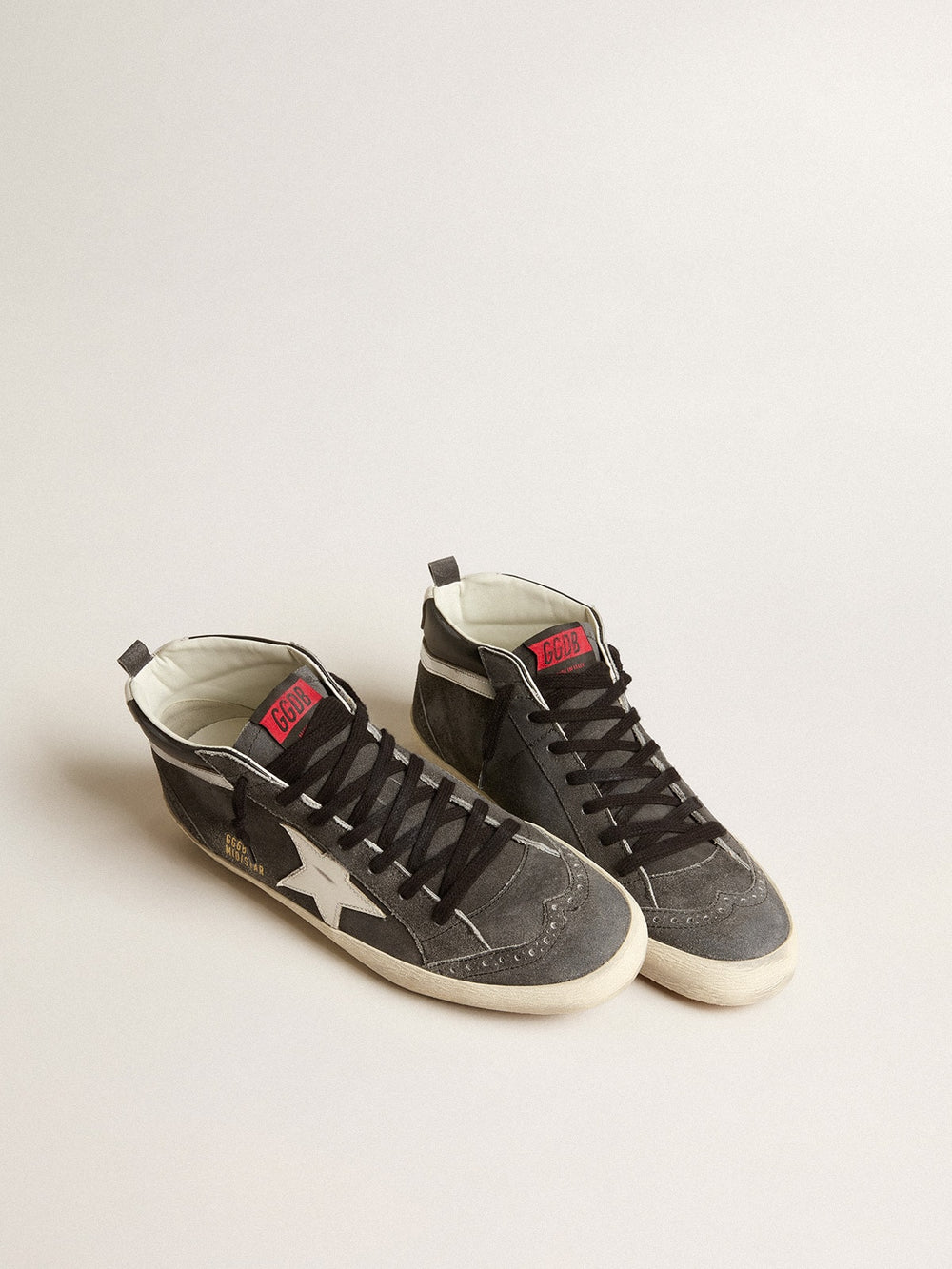 Golden Goose Mid Star in black suede with white leather star and silver flash