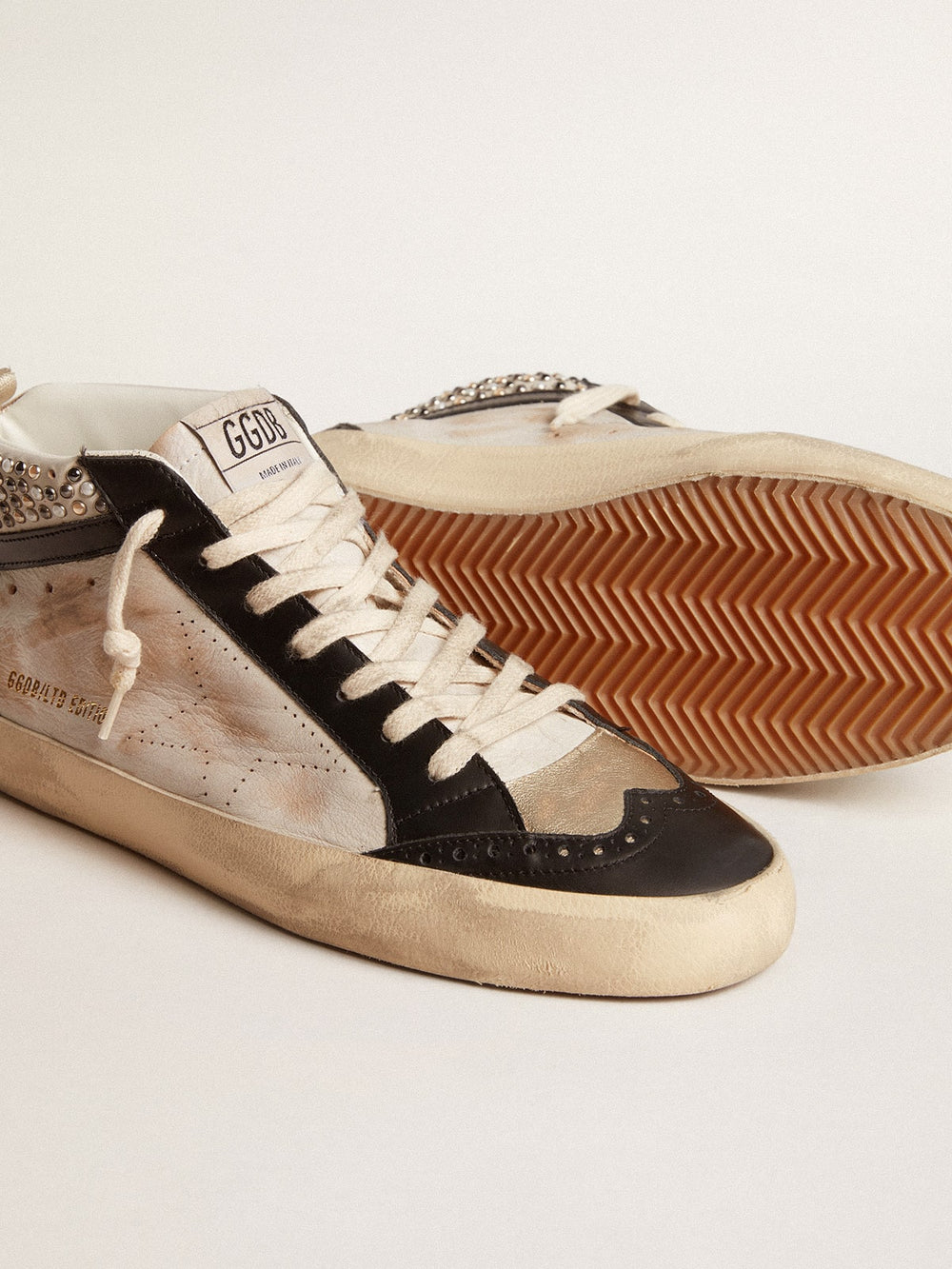 Golden Goose Men’s Mid Star LTD in black and white leather with pearls and perforated star