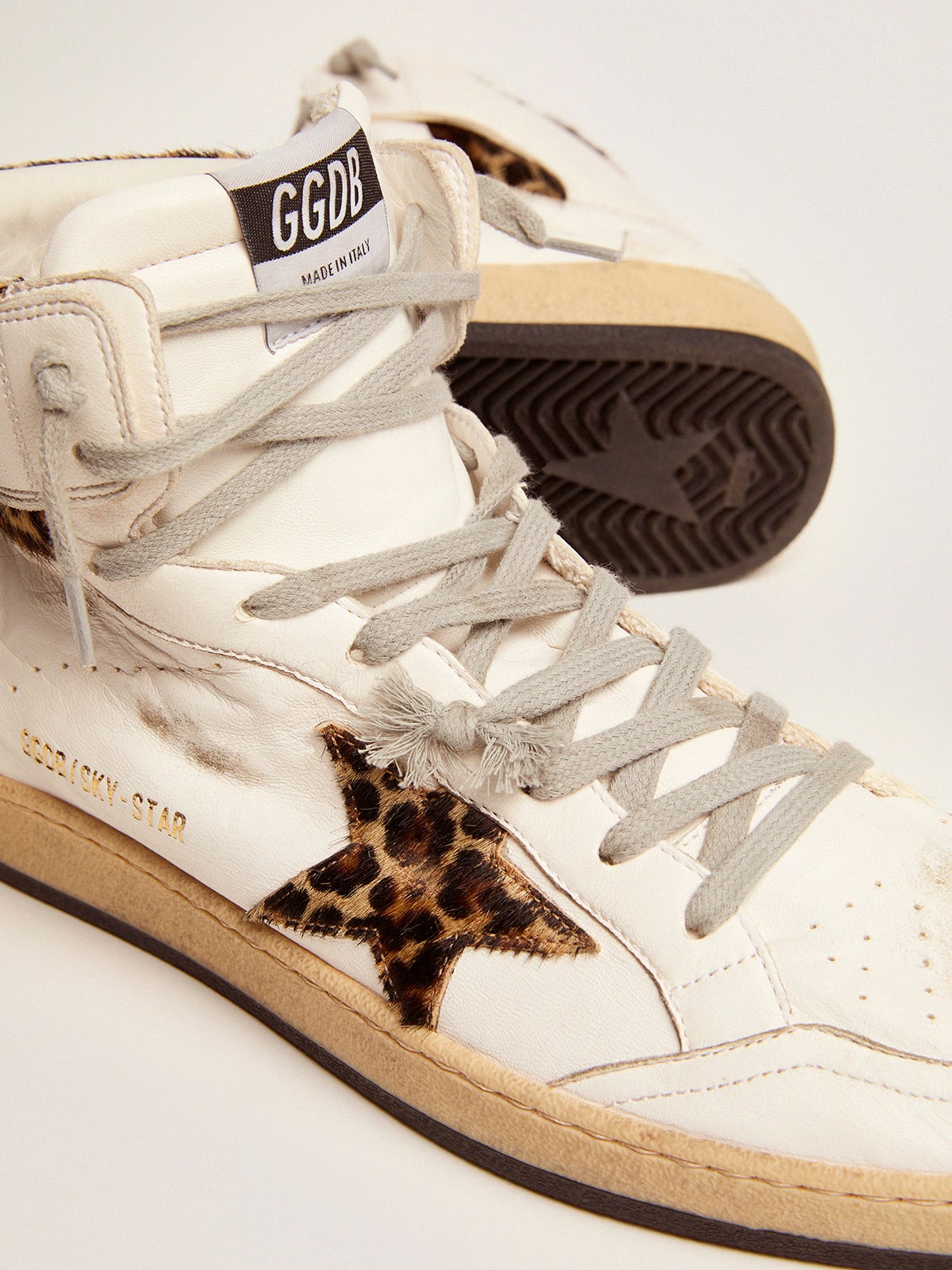 Golden Goose Sky-Star sneakers with signature on the ankle and leopard-print pony skin inserts