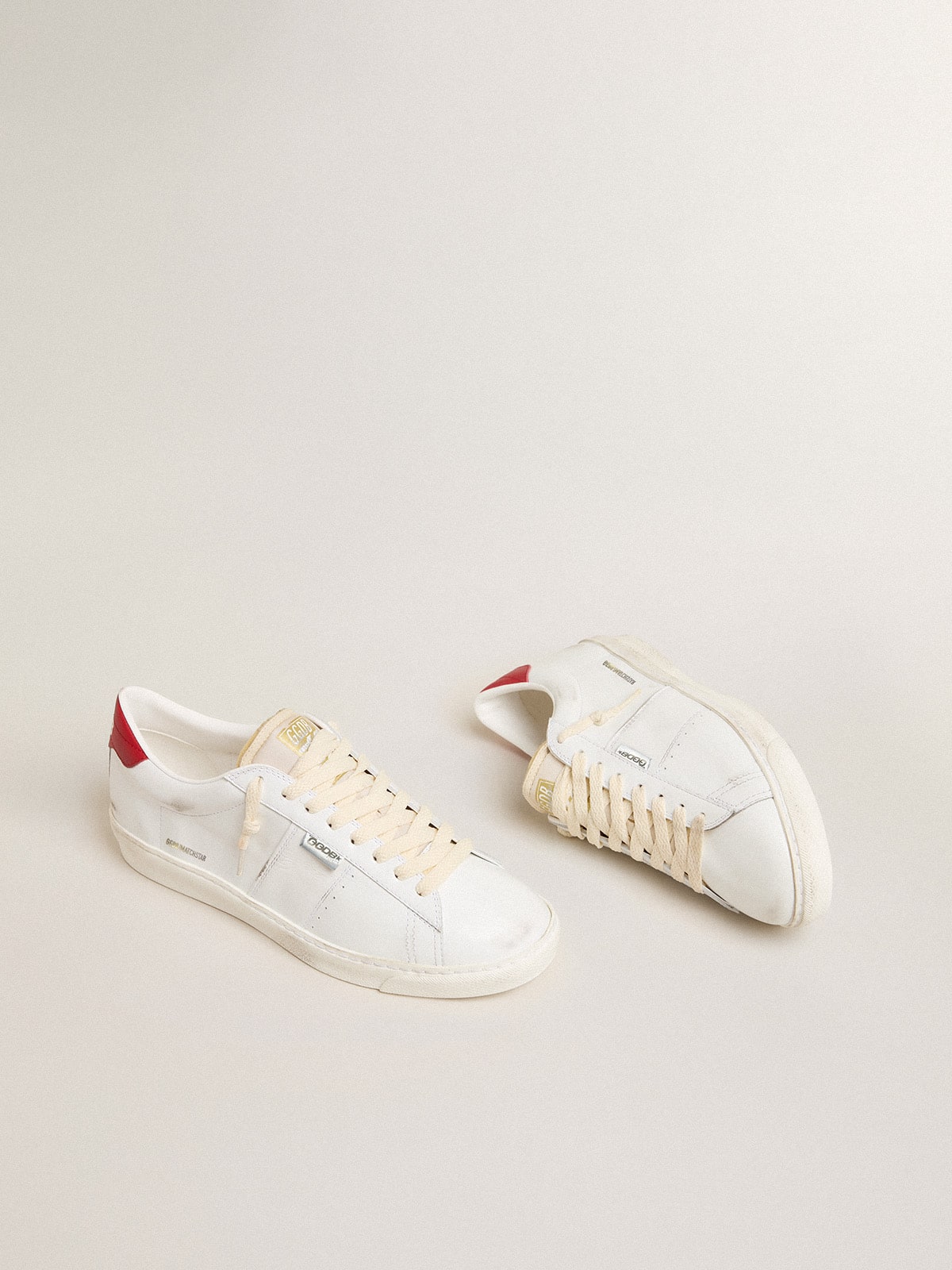 Golden Goose Matchstar in glossy white leather with glossy red leather heel tab