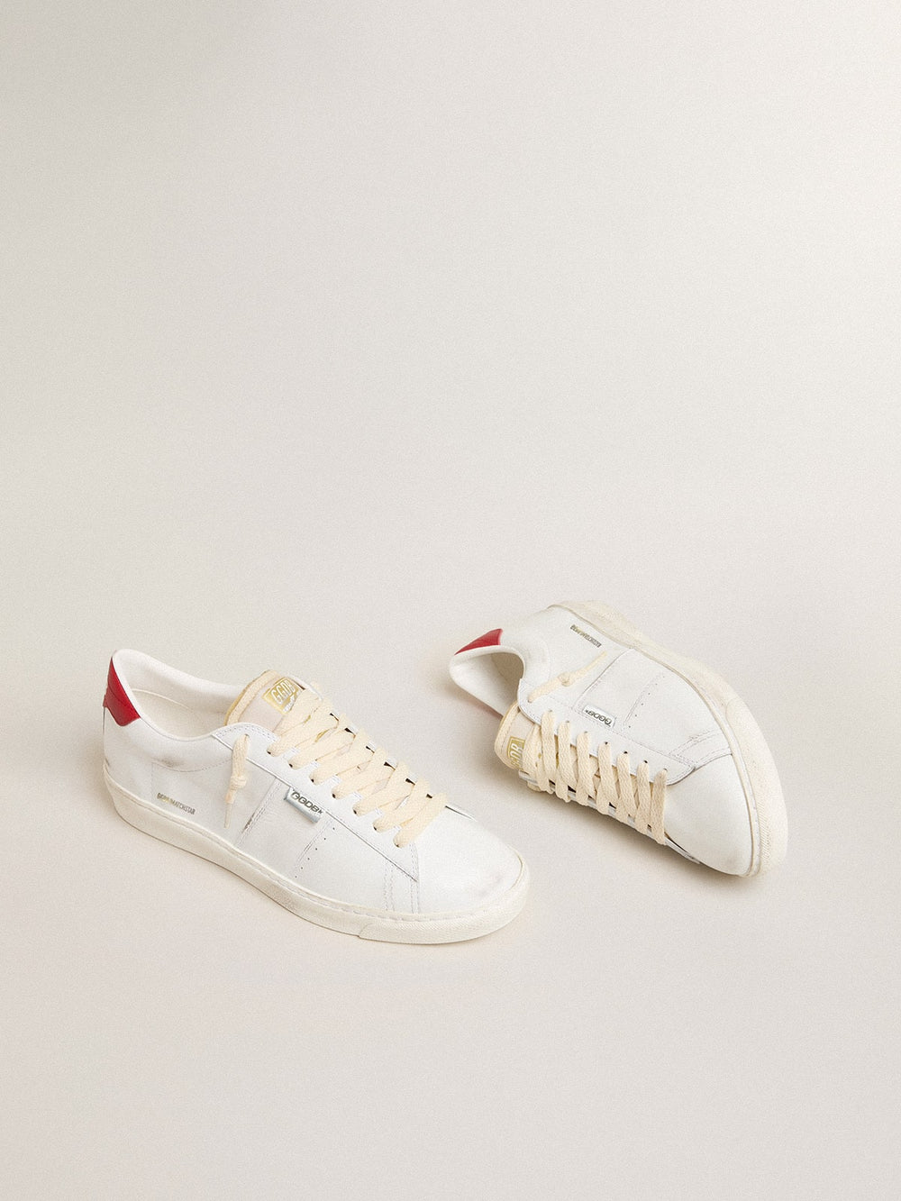 Golden Goose Matchstar in glossy white leather with glossy red leather heel tab