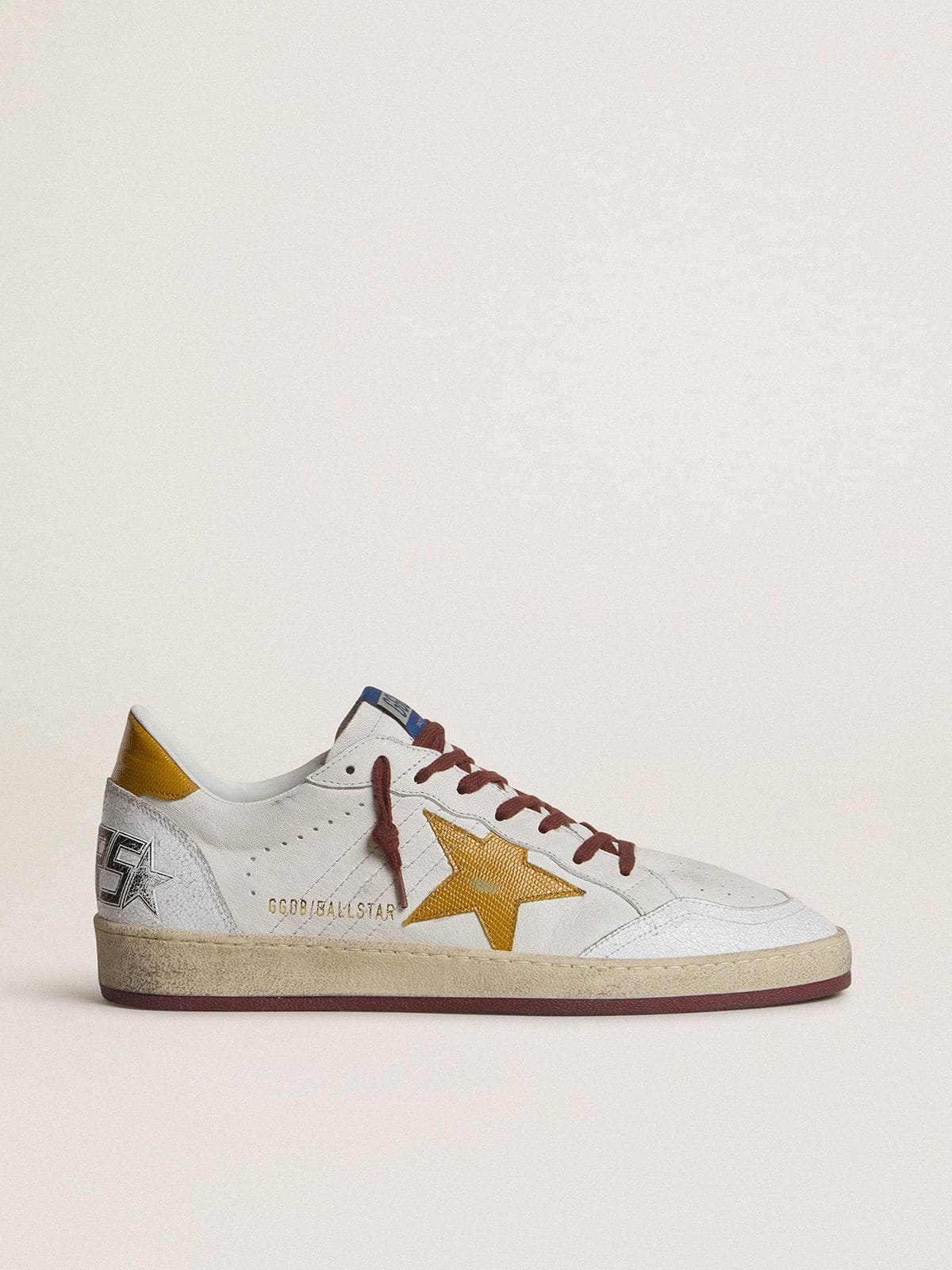 Golden Goose Men's Ball Star in white nappa leather with yellow animal-print leather star and heel tab